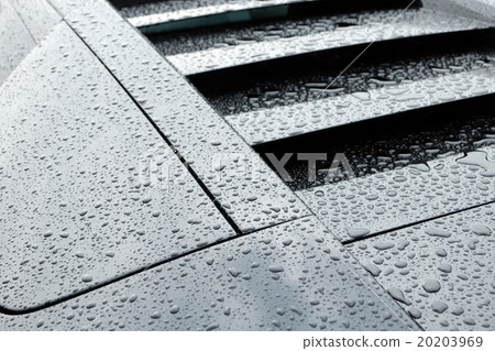 Droplets on black sport car 20203969