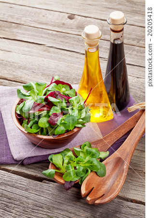 Corn salad leaves and condiments 20205418