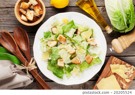 Fresh healthy caesar salad cooking 20205524