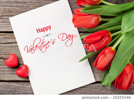 Red tulips, blank card and candy hearts Red tulips, blank card and candy hearts 20205546