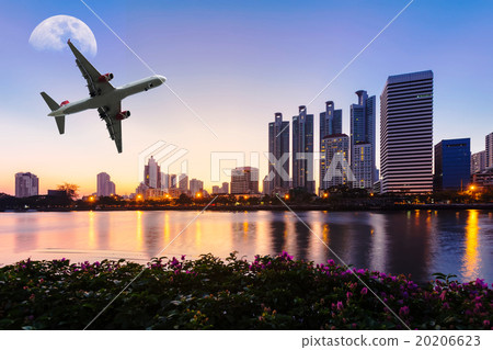 Modern building with flower, airplane and moon 20206623
