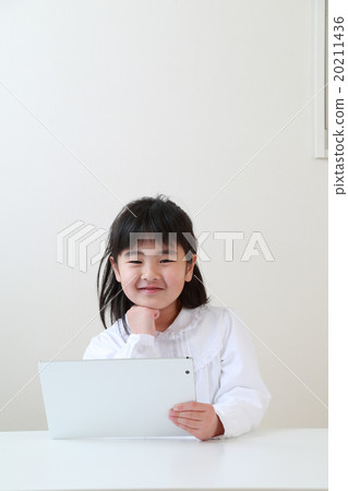 Children watching tablets 20211436