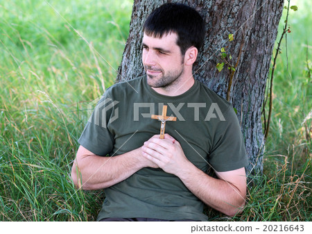 Man with cross Man with cross 20216643