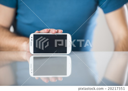 Man with smartphone Man with smartphone 20217351