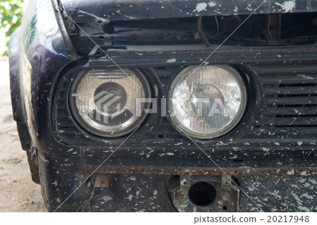 A closeup of the headlights and front bumper A closeup of the headlights and front bumper 20217948