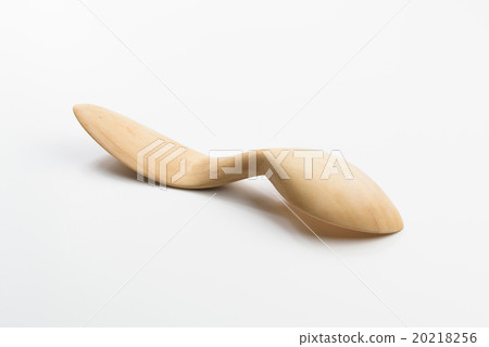 Wooden spoon on white background 20218256