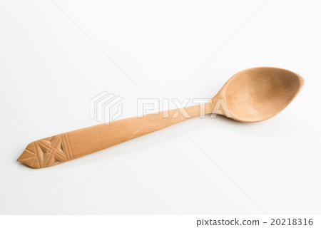 Wooden spoon on white background 20218316