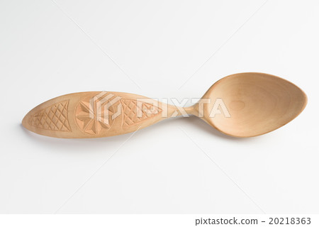 Wooden spoon on white background 20218363