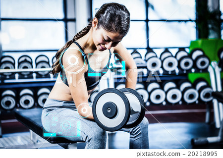 Composite image of woman working out in gym Composite image of woman working out in gym 20218995