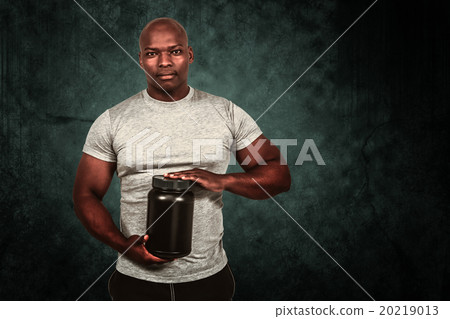 Composite image of fit man with protein powder  20219013