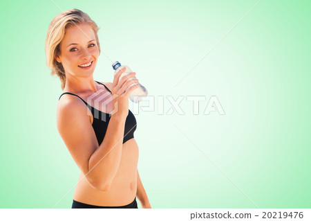 Composite image of fit blonde drinking water Composite image of fit blonde drinking water 20219476
