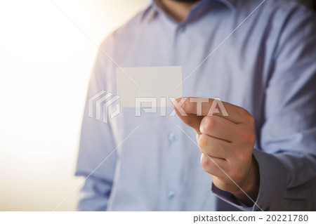 Man holding white business card  20221780