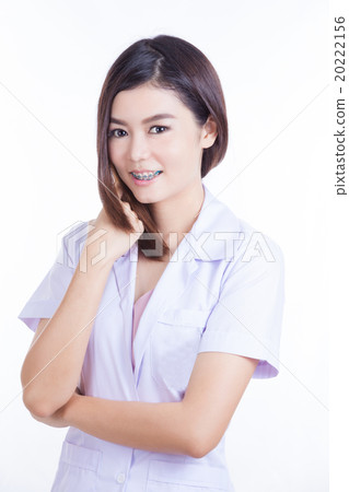 Portrait of smiling woman in white robe Portrait of smiling woman in white robe 20222156