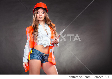 Woman structural engineer with tablet working. Woman structural engineer with tablet working. 20225924
