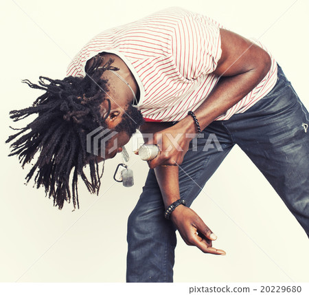 young handsome african american boy singing 20229680