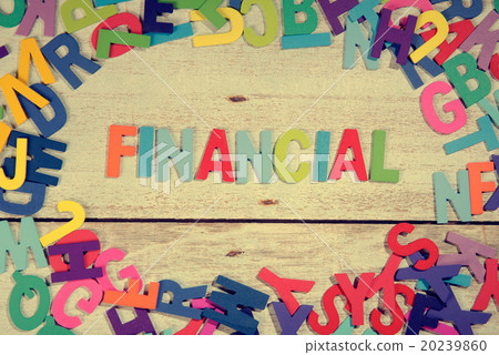 financial word block concept photo on plank wood 20239860