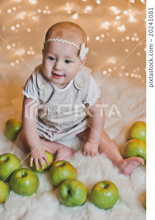 The little girl creeps on a floor 2929. 20241081