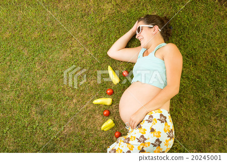 Pregnant woman with vegetables Pregnant woman with vegetables 20245001