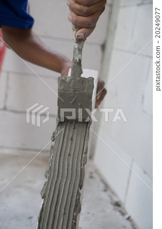 worker plastering stack lightweight Concrete block worker plastering stack lightweight Concrete block 20249077