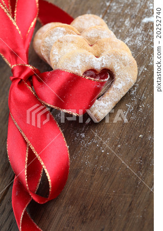 Red ribbon with shortbread hearts Red ribbon with shortbread hearts 20252740