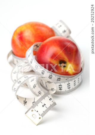 Tape measure and nectarines Tape measure and nectarines 20252924
