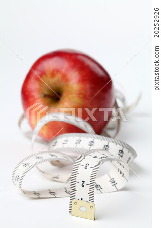 Tape measure and red apple Tape measure and red apple 20252926