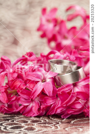 Wedding rings on red hyacinth Wedding rings on red hyacinth 20253320