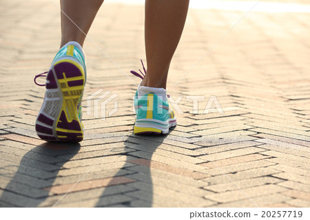 young fitness woman runner legs ready for a new start 20257719