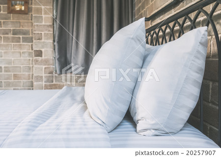Pillows on bed decoration in bedroom interior 20257907