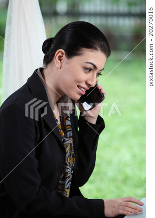 business woman on the phone business woman on the phone 20270016