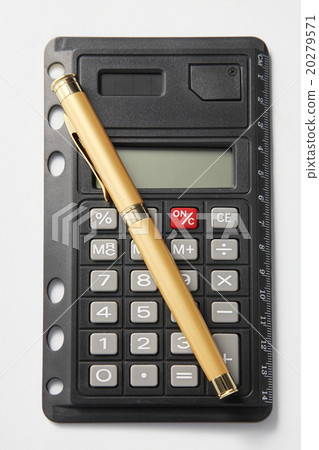 pen and a calculator 20279571