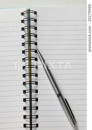 Writing pen on the blank page 20279998