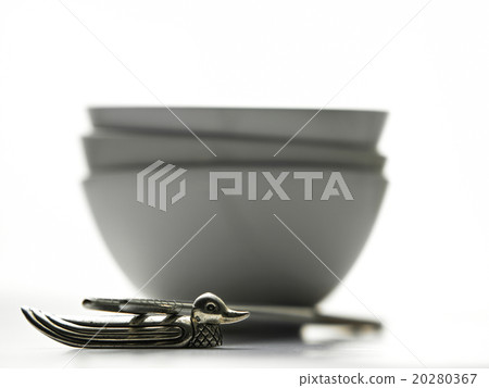 Chopsticks and stacks of white bowls Chopsticks and stacks of white bowls 20280367