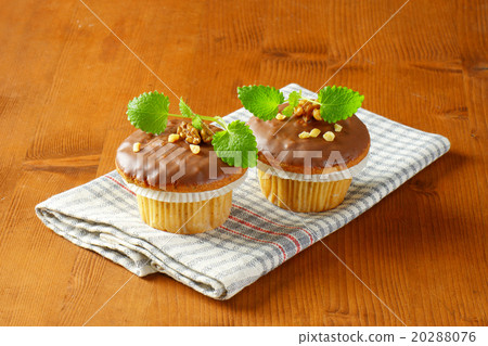 Chocolate glazed muffins 20288076