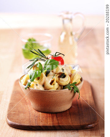 Tortellini with pesto and sauce Tortellini with pesto and sauce 20288199