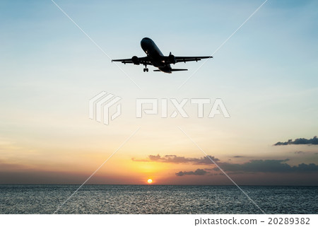 Plane with sky sunset and sea 20289382