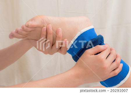 Patient with ankle sprain using ankle support Patient with ankle sprain using ankle support 20291007