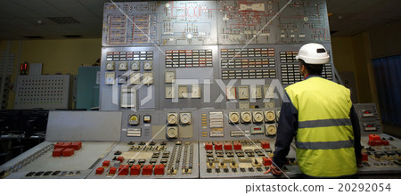Operator at work place in the system control room 20292054
