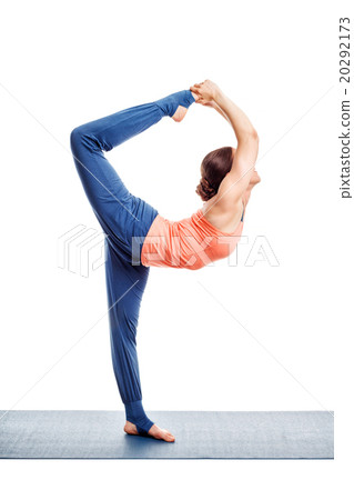 Woman doing yoga asana Natarajasana 20292173