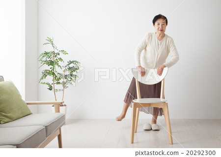 Senior lady at home athletic chair 20292300