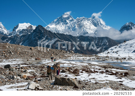 Mt.Everest and a group of porters at Renjo pass 20292533