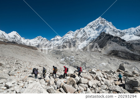 Trekkers hiking in the Everest region Trekkers hiking in the Everest region 20293294