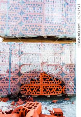 Stack of silicate bricks with the pile Stack of silicate bricks with the pile 20294751