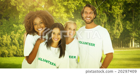 Composite image of smiling group of volunteers 20297409