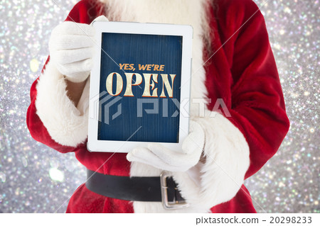 Composite image of santa claus showing tablet pc Composite image of santa claus showing tablet pc 20298233
