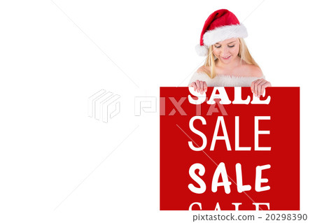 Composite image of festive cute blonde holding poster Composite image of festive cute blonde holding poster 20298390