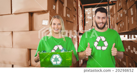 Composite image of portrait of cheerful volunteers in recycling Composite image of portrait of cheerful volunteers in recycling 20298652