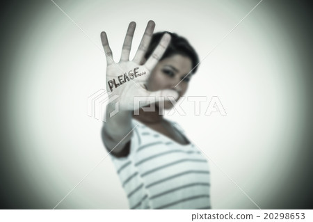 Composite image of serious woman making stop sign over white bac Composite image of serious woman making stop sign over white bac 20298653