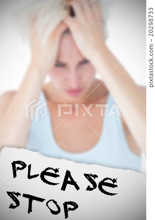 Composite image of sad blonde woman with head pain holding her h Composite image of sad blonde woman with head pain holding her h 20298733