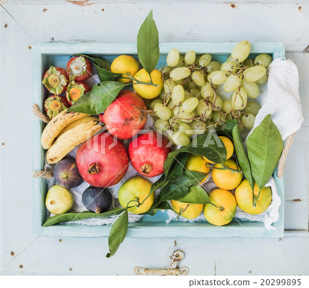 Various colorful tropical fruit selection in blue 20299895